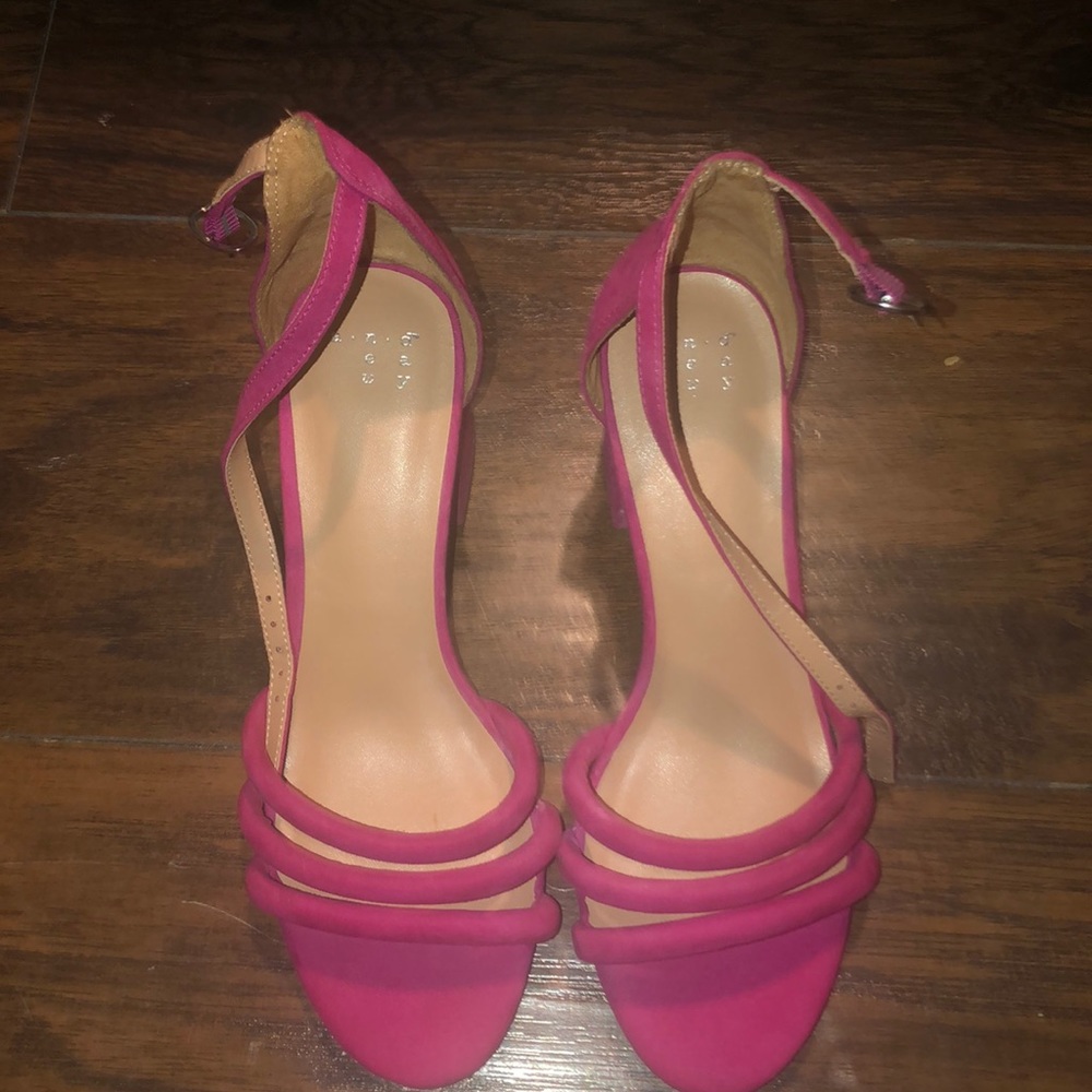 A new day pink heels .